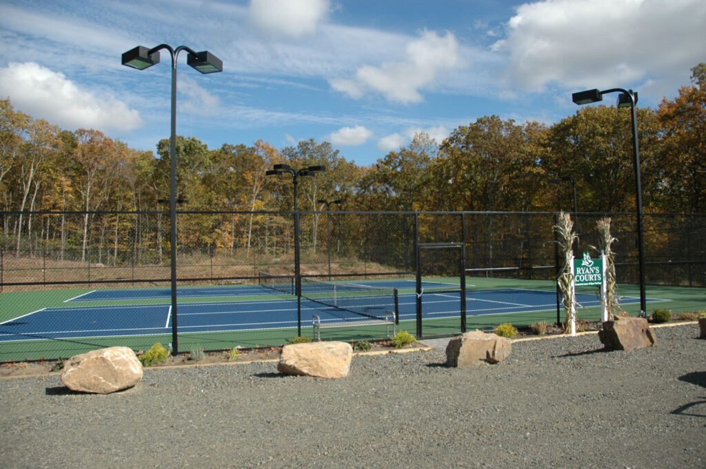 You don’t need to remove the asphalt to install a tennis court Classic Turf
